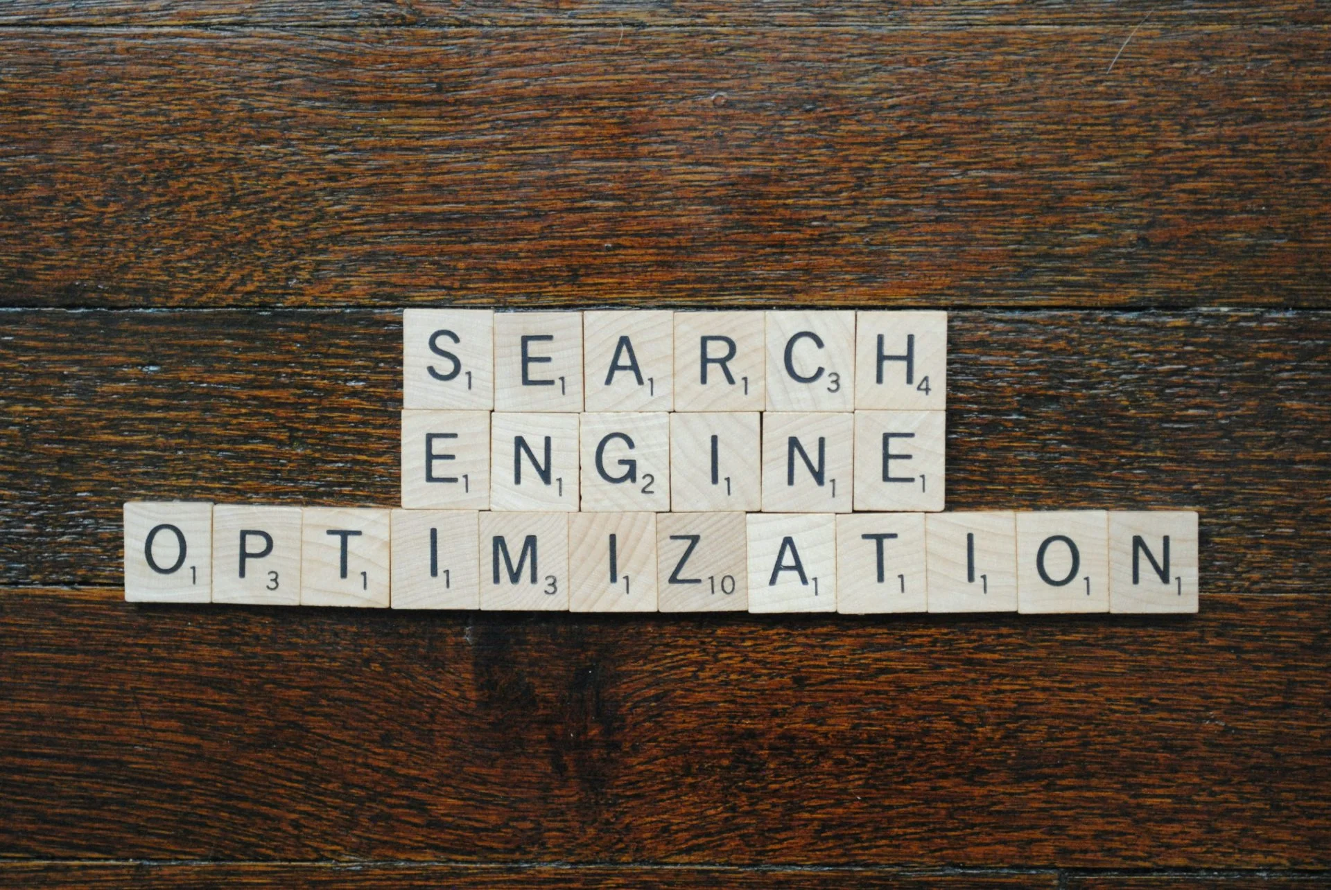 Search engine optimization spelled out with scrabble tiles