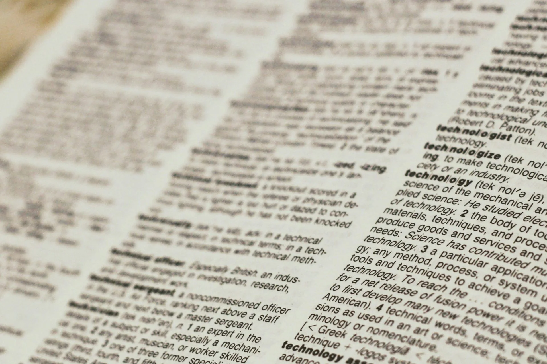 An open dictionary showing the definition of technology