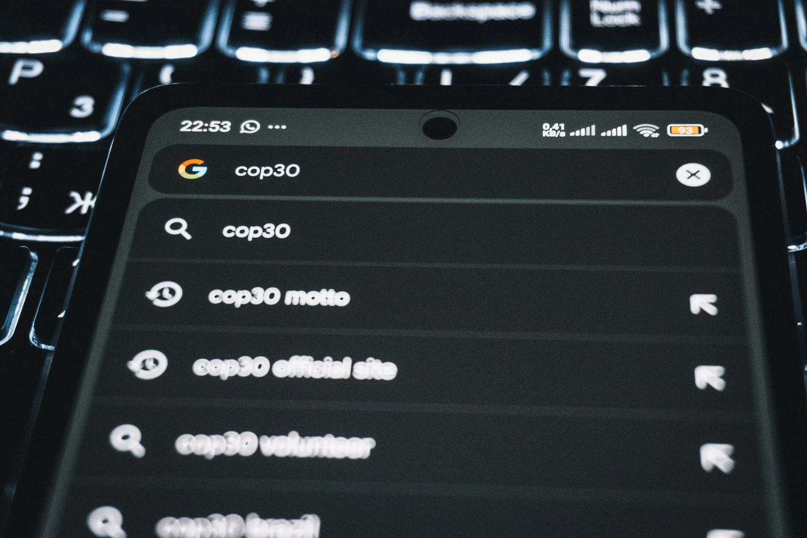 Smartphone displaying Google search results illustrating search intent