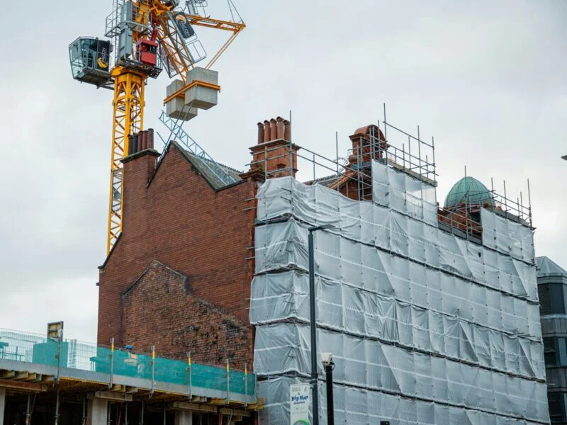 Construction site with crane representing local SEO for builders